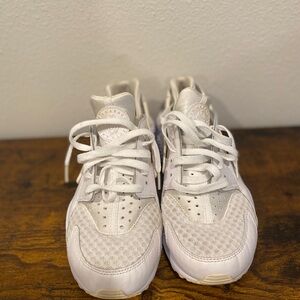 The Nike Air Huarache Run All White Blank Canvas sneakers are stylish.